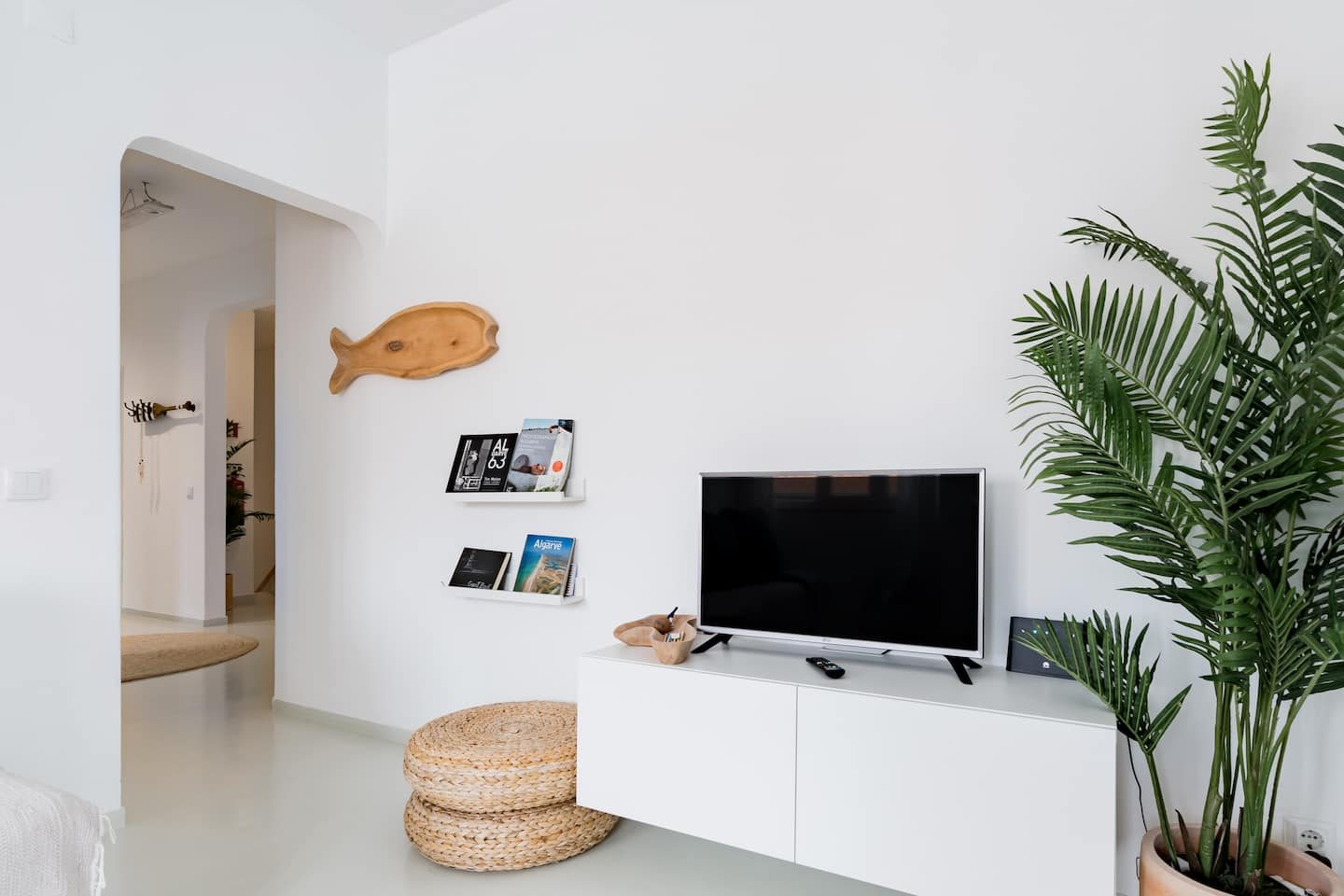 Lime House living room with sofa and TV