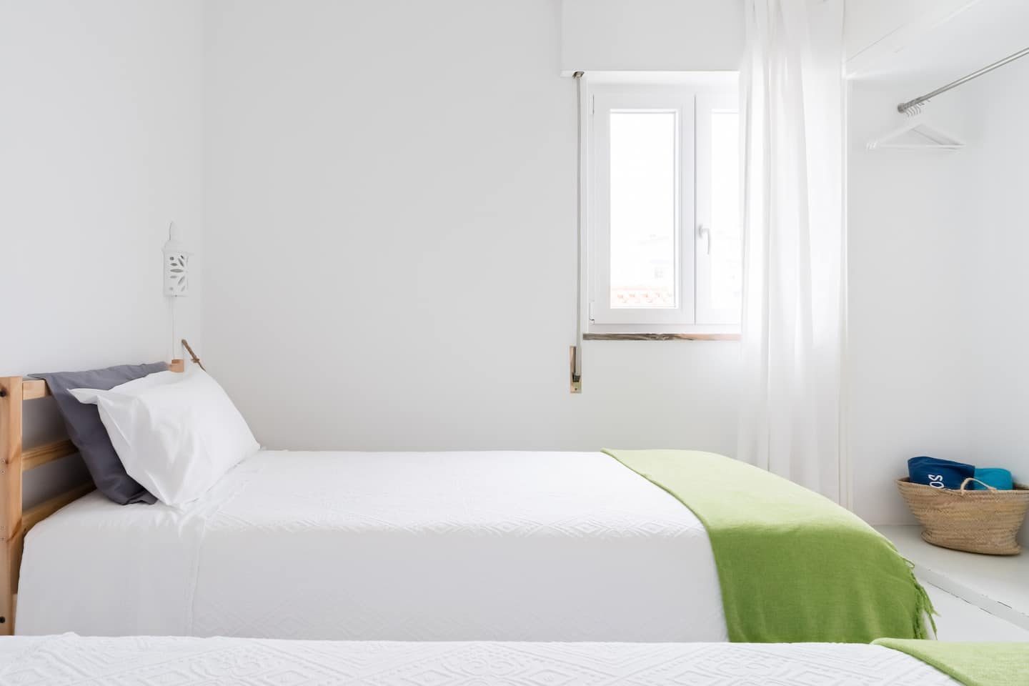 Lime House bedroom with two single beds