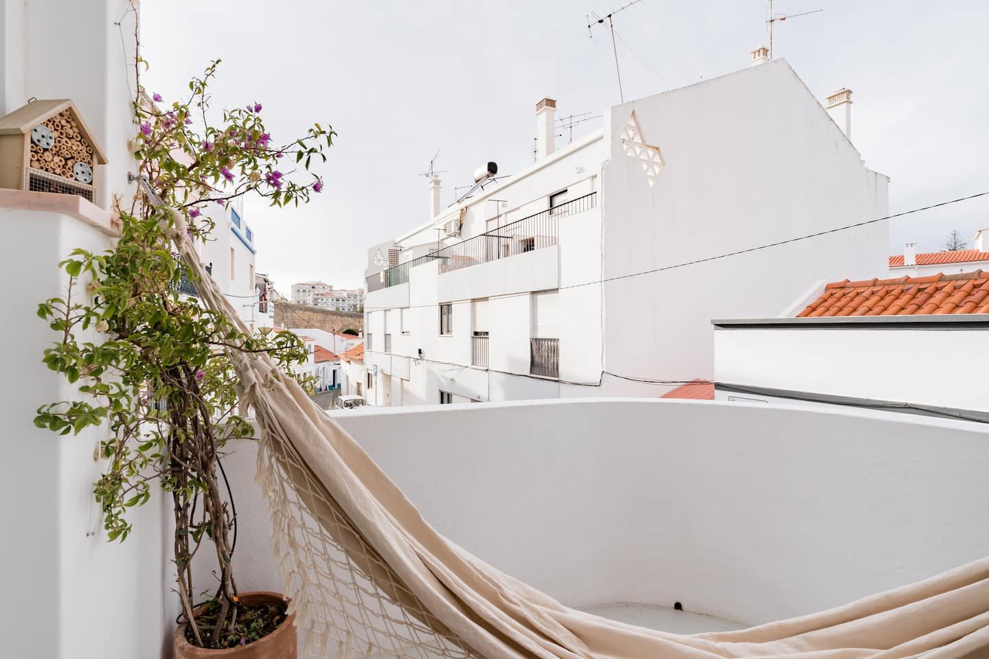 Lime House terrace with hammock over the rooftops of Lagos